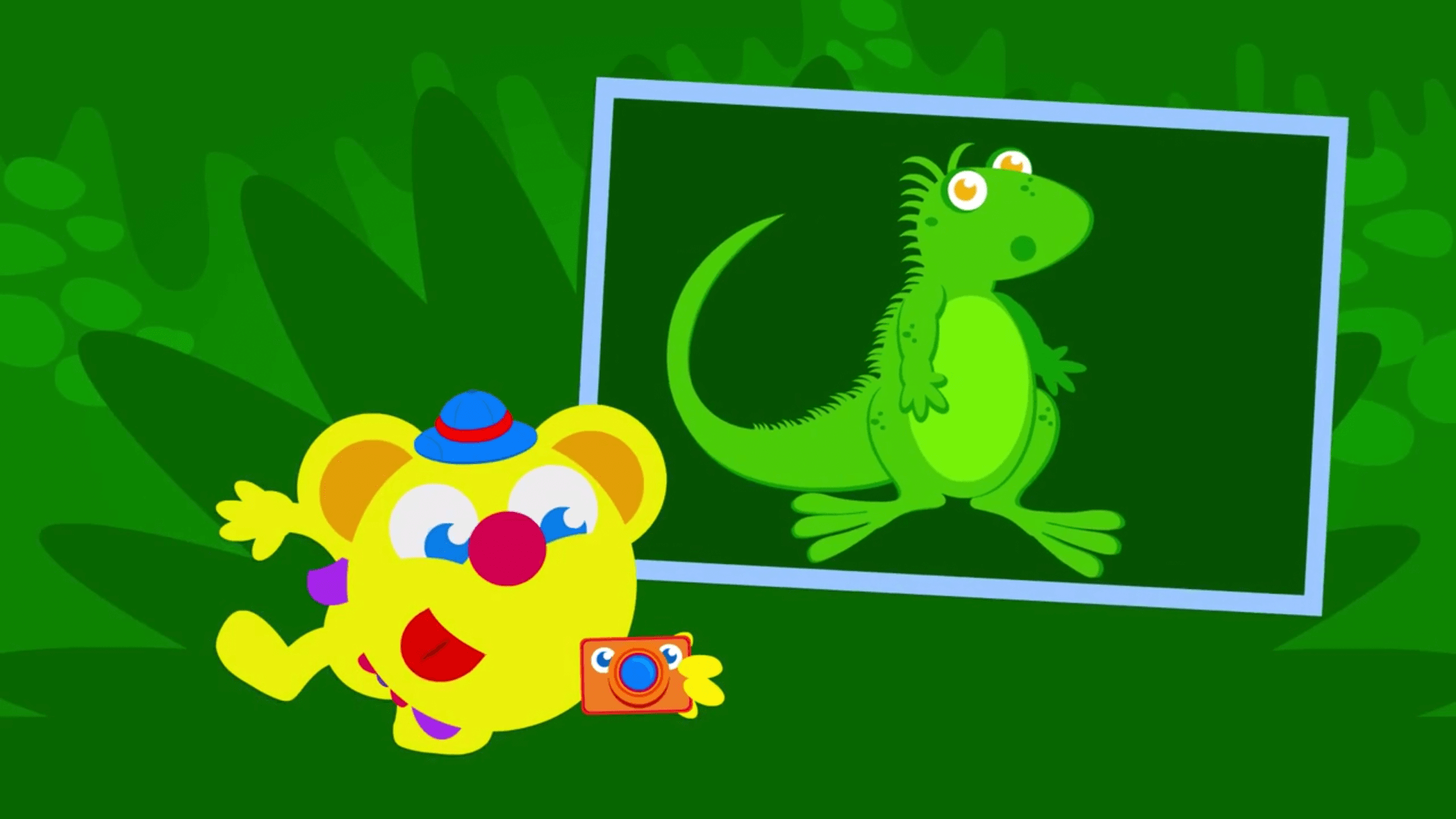 freddy takes a photo of an iguana in jungle living episode of the kneebouncers show on babyfirsttv